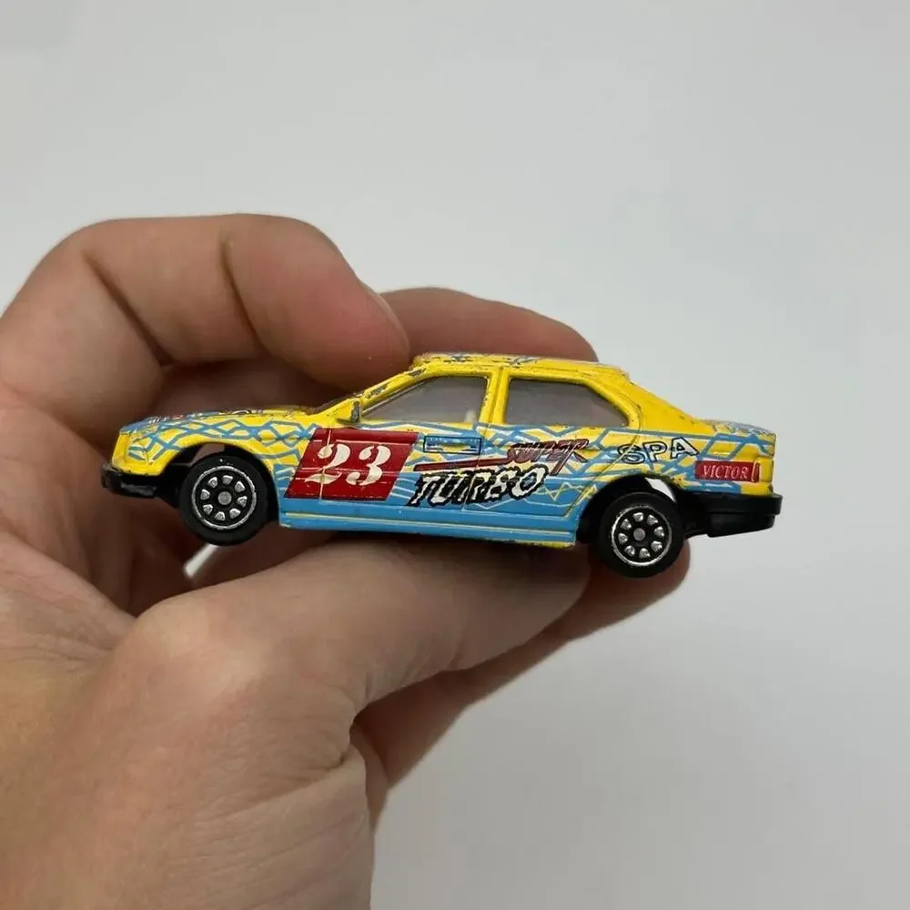 Vintage 90s Pioneer BMW 3 Series Turbo 1:64 Diecast Yellow Mini Car